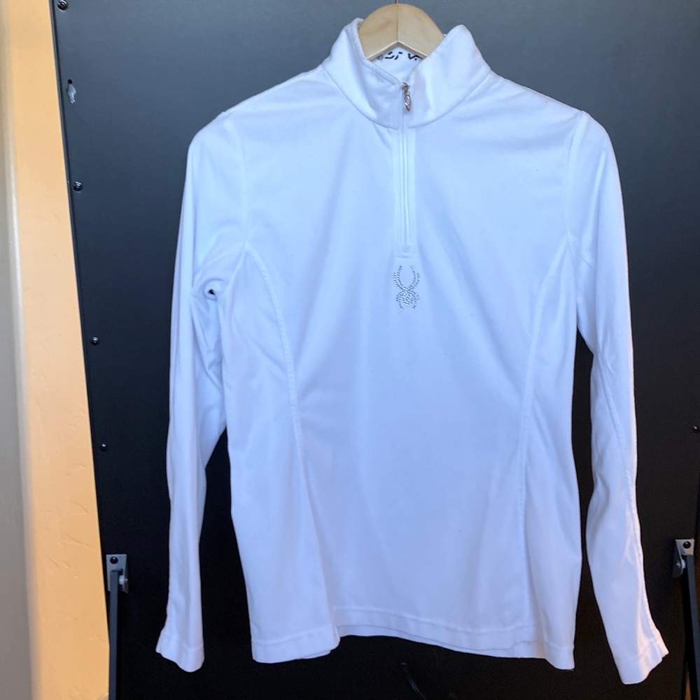 Spyder 3/4 zip, white, soft knit with rhinestone logo.